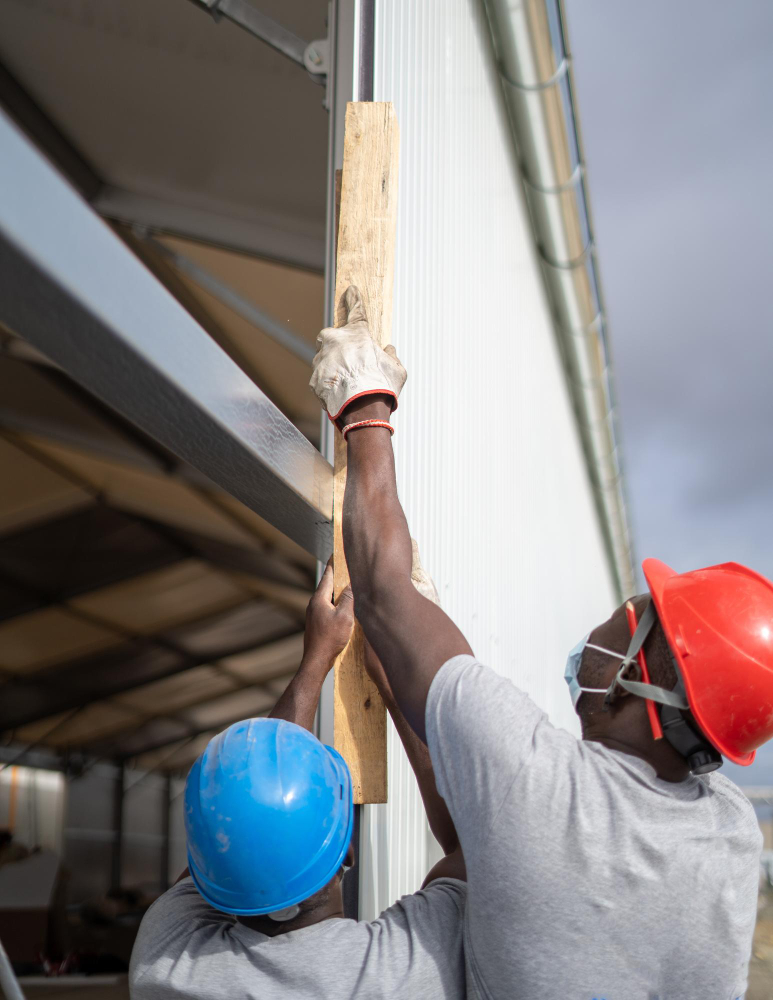 Men working om a building